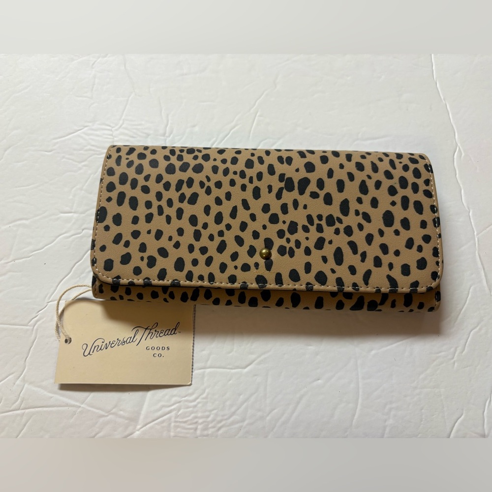 Universal Standard tan and black animal print wallet